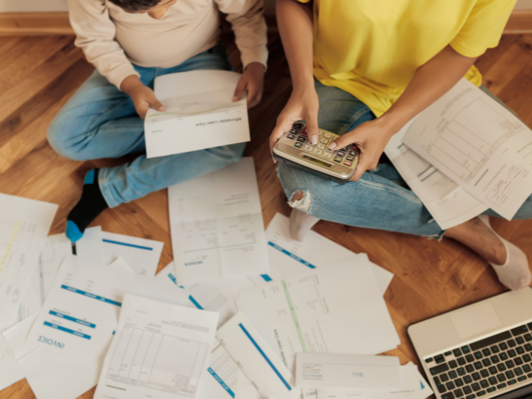 A couple looking at bills