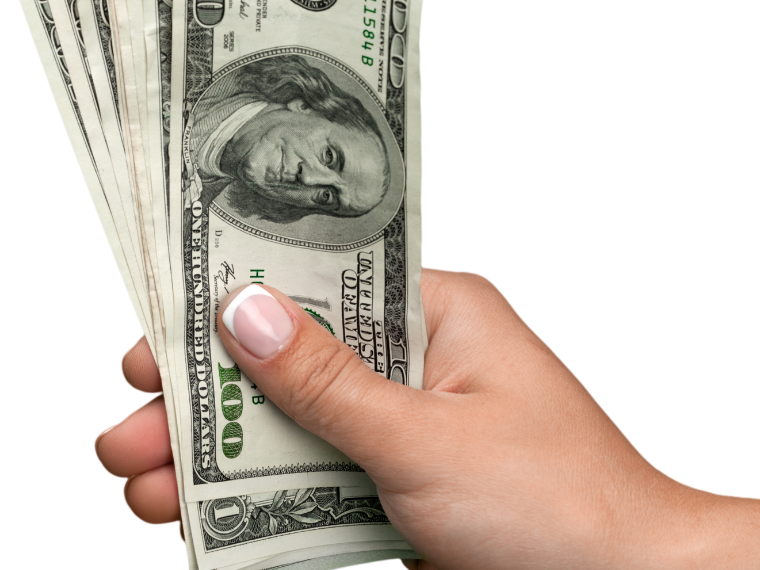 A hand holding sever 100 dollar bills