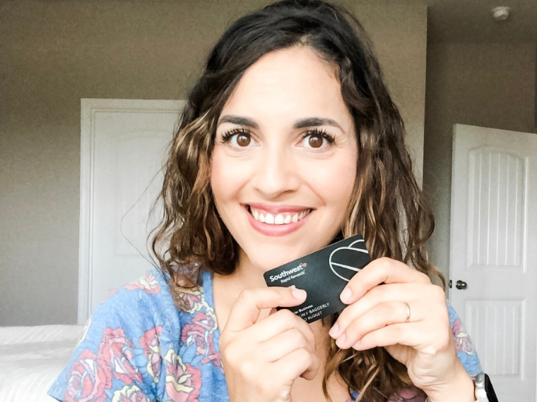 Woman holding a credit card