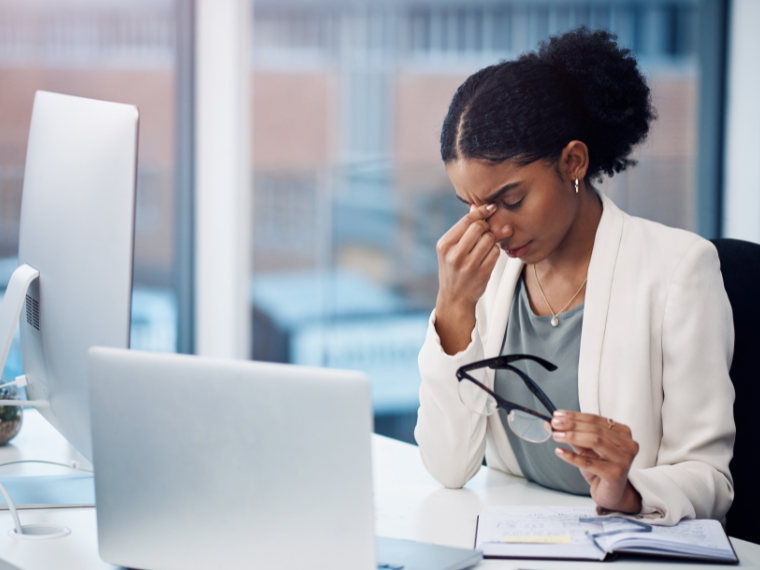 Tired woman at the computer