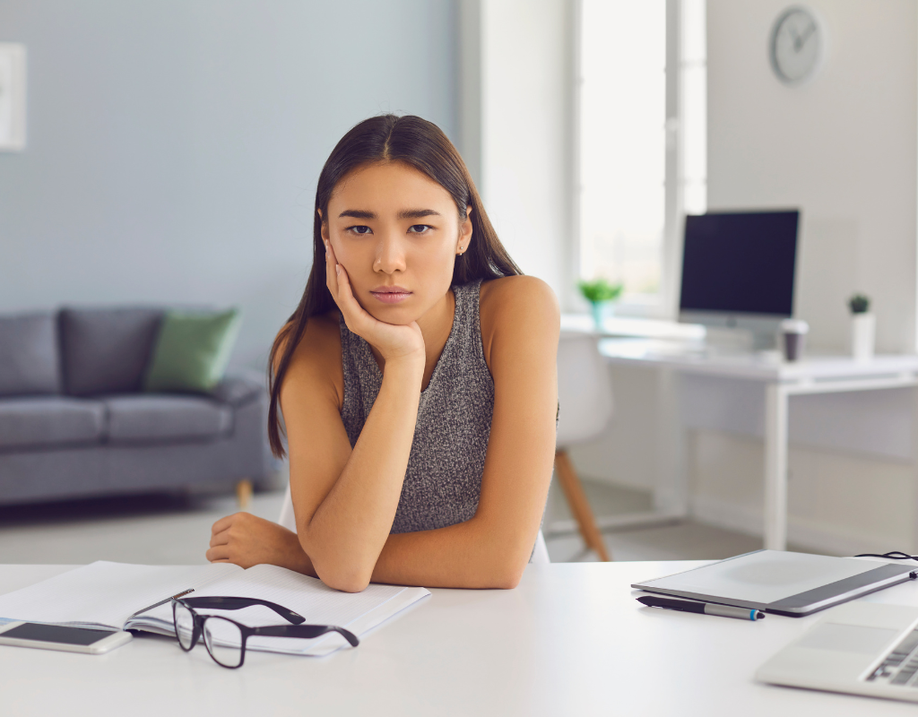 Bored teen on her laptop